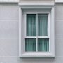 Modern new residential building windows with curtain uv protection inside. outdoor view.